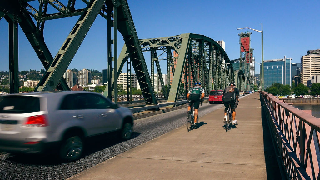 Bicyclists riding in special lane on bridge in Portland